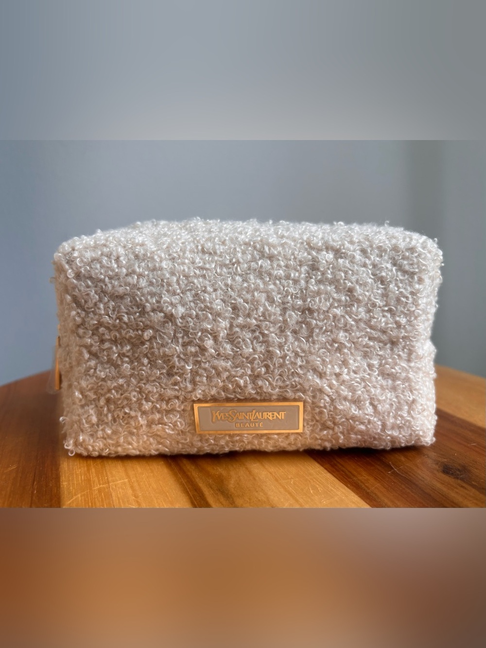 YSL Beaute Cream Sherpa Make-up Bag with Gold Zipper.